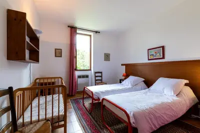 Un ou plusieurs lits dans un hébergement de l'établissement Villa pleine nature proche plages - 7 chambres