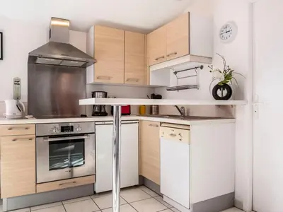 Cuisine ou kitchenette dans l'établissement Studio Camijeanne by Interhome