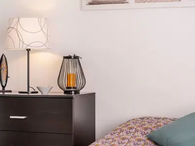 Un ou plusieurs lits dans un hébergement de l'établissement Studio Camijeanne by Interhome