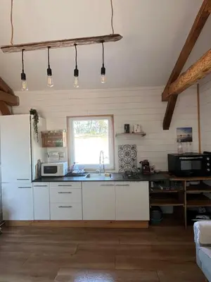 Cuisine ou kitchenette dans l'établissement Gîte au cœur des Landes