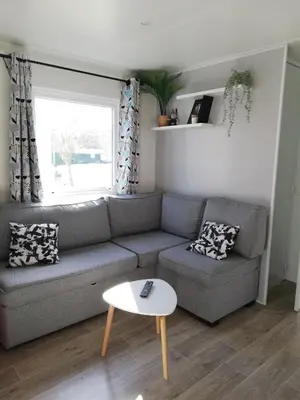 Coin salon dans l'établissement Sbvacances TOUT CONFORT 2ch et 1sdb, environnement CALME et VERDOYANT dans camping 4 étoiles