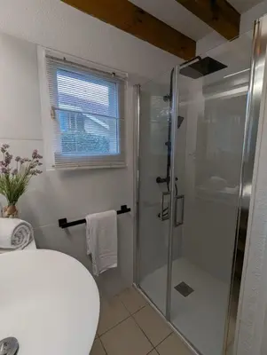 Salle de bains dans l'établissement Beautiful 67 m duplex with gardengolf view