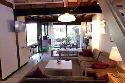 Coin salon dans l'établissement Beautiful 67 m duplex with gardengolf view
