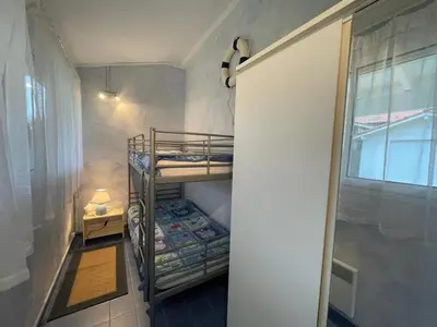 Un ou plusieurs lits dans un hébergement de l'établissement Villa landaise charmante pour 6 pers avec grand jardin - Capbreton - FR-1-413-211