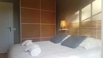 Un ou plusieurs lits dans un hébergement de l'établissement Chambres d'hôtes, meublé tourisme de France étoilé, 5 minutes de l'océan, 2 vélos à disposition