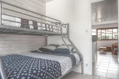 Un ou plusieurs lits dans un hébergement de l'établissement Appartement cosy au calme