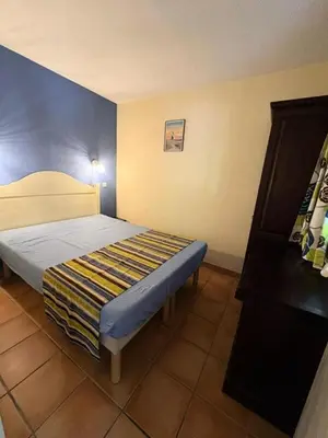 Un ou plusieurs lits dans un hébergement de l'établissement Le Domaine du Golf de Pinsolle - maeva Home - Appartement 2 pièces 5 personnes - Sélection MAE-8544