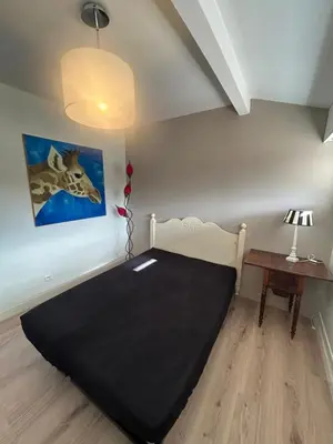 Un ou plusieurs lits dans un hébergement de l'établissement Villa 8 personnes proche d'Hossegor au bord du Golf de Pinsolle