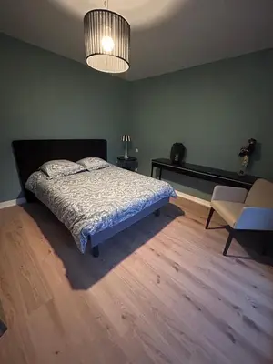 Un ou plusieurs lits dans un hébergement de l'établissement Villa 8 personnes proche d'Hossegor au bord du Golf de Pinsolle