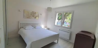 Un ou plusieurs lits dans un hébergement de l'établissement Bassin d'Arcachon belle villa moderne 4 chambres et piscine privée