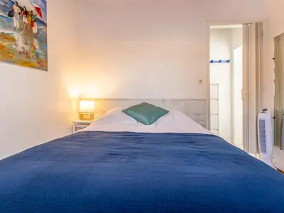 Un ou plusieurs lits dans un hébergement de l'établissement Apartment Iena by Interhome