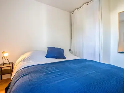 Un ou plusieurs lits dans un hébergement de l'établissement Apartment La Louisiane by Interhome