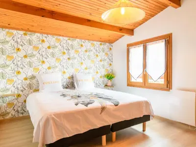 Un ou plusieurs lits dans un hébergement de l'établissement Holiday Home Yuvita by Interhome