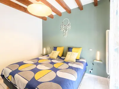 Un ou plusieurs lits dans un hébergement de l'établissement Holiday Home Yuvita by Interhome