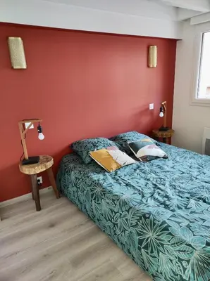 Un ou plusieurs lits dans un hébergement de l'établissement Maisonnette neuve plage et commerces à pied