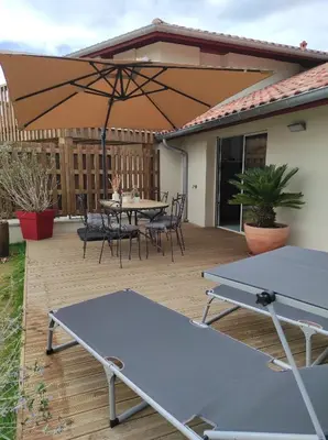 Balcon ou terrasse dans l'établissement Maisonnette neuve plage et commerces à pied