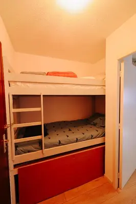 Un ou plusieurs lits dans un hébergement de l'établissement Appart cosy proche de la plage.