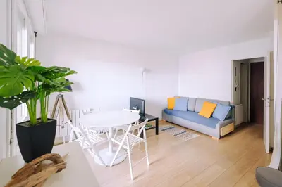 Coin salon dans l'établissement Appart cosy proche de la plage.