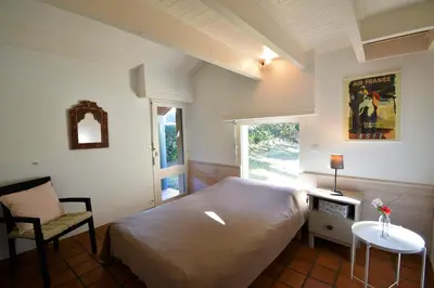Un ou plusieurs lits dans un hébergement de l'établissement Tiokers - Hossegor - Confortable villa sur terrain clos idéalement située entre lac et Océan et à 1200m du centre ville