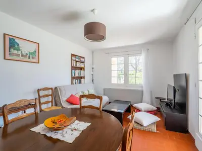 Coin salon dans l'établissement Maison 3* à Mimizan Plage, 6 pers, jardin clos, proche plages et activités - FR-1-50-110