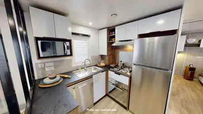 Cuisine ou kitchenette dans l'établissement Camping Officiel Siblu La Plage