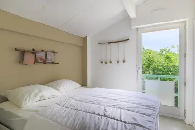 Un ou plusieurs lits dans un hébergement de l'établissement Biscarrosse Lac Duplex avec jardin 6 personnes