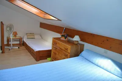 Un ou plusieurs lits dans un hébergement de l'établissement Biscarrosse Lac Navarrosse Duplex avec mezzanine classé 1 étoile