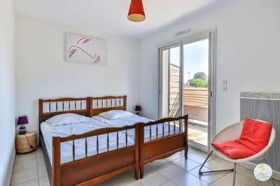 Un ou plusieurs lits dans un hébergement de l'établissement Biscarrosse bourg Duplex proche commerces 6 couchages