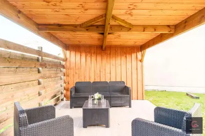 Coin salon dans l'établissement Biscarrosse Bourg Maison tout confort en centre ville