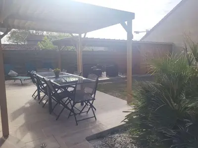 Jardin de l'établissement Biscarrosse Bourg Maison tout confort en centre ville