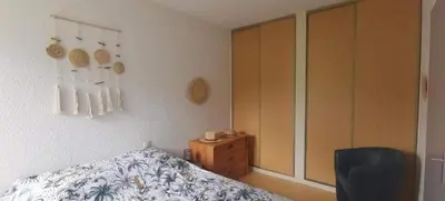 Un ou plusieurs lits dans un hébergement de l'établissement Rêve de Bisca Appartement spacieux climatisé avec jardin privatif piscine et parking privés