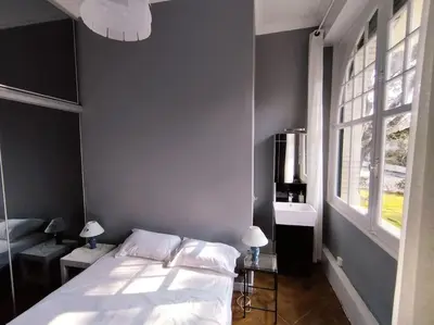 Un ou plusieurs lits dans un hébergement de l'établissement Le Moulleau Appartement 2 chambres - plage à 50m