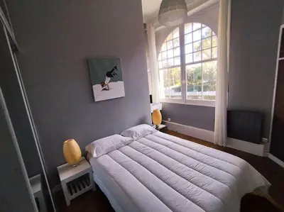 Un ou plusieurs lits dans un hébergement de l'établissement Le Moulleau Appartement 2 chambres - plage à 50m