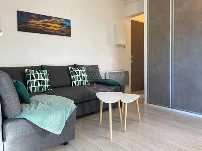 Coin salon dans l'établissement Appartement Marine