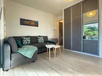 Coin salon dans l'établissement Appartement Marine
