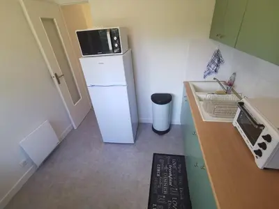 Cuisine ou kitchenette dans l'établissement Résidence ORION- Appartement pour 2 à 3 personnes- Wifi gratuit