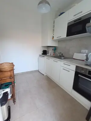 Cuisine ou kitchenette dans l'établissement Pyla-sur-mer maison 2 chambres et jardin - à 400m des plages