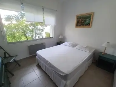 Un ou plusieurs lits dans un hébergement de l'établissement Pyla-sur-mer maison 2 chambres et jardin - à 400m des plages