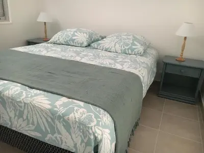 Un ou plusieurs lits dans un hébergement de l'établissement Pyla-sur-mer maison 2 chambres et jardin - à 400m des plages