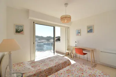 Un ou plusieurs lits dans un hébergement de l'établissement Horizon - Hossegor appartement situé au deuxième et dernier étage d'une résidence avec ascenseur magnifique vue sur l'océan