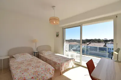 Un ou plusieurs lits dans un hébergement de l'établissement Horizon - Hossegor appartement situé au deuxième et dernier étage d'une résidence avec ascenseur magnifique vue sur l'océan