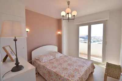 Un ou plusieurs lits dans un hébergement de l'établissement Horizon - Hossegor appartement situé au deuxième et dernier étage d'une résidence avec ascenseur magnifique vue sur l'océan