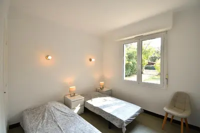 Un ou plusieurs lits dans un hébergement de l'établissement Laridente - Hossegor agréable villa située dans un quartier calme entre lac et océan