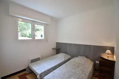 Un ou plusieurs lits dans un hébergement de l'établissement Laridente - Hossegor agréable villa située dans un quartier calme entre lac et océan