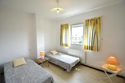 Un ou plusieurs lits dans un hébergement de l'établissement Ben et sou - Hossegor appartement avec agréable terrasse au premier étage d'une villa