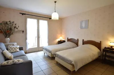 Un ou plusieurs lits dans un hébergement de l'établissement La rose du pley - Seignosse spacieuse villa dans quartier calme et résidentiel