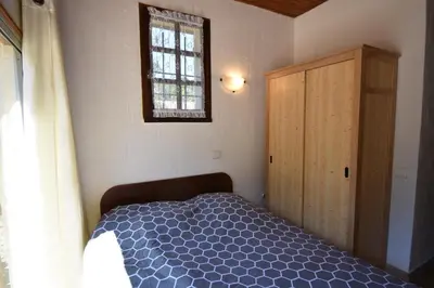 Un ou plusieurs lits dans un hébergement de l'établissement Braserade B - Seignosse agréable villa landaise dans quartier calme et résidentiel proche des plages et d'un petit centre commercial
