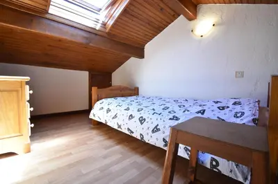 Un ou plusieurs lits dans un hébergement de l'établissement Braserade B - Seignosse agréable villa landaise dans quartier calme et résidentiel proche des plages et d'un petit centre commercial
