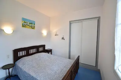 Un ou plusieurs lits dans un hébergement de l'établissement 1451 TCF - Hossegor villa plain pied en bordure du lac marin avec agréable vue sur le lac et située à environ 1000m du centre ville