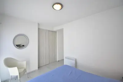 Un ou plusieurs lits dans un hébergement de l'établissement Square Leon Desclaux - Seignosse confortable villa contemporaine avec piscine